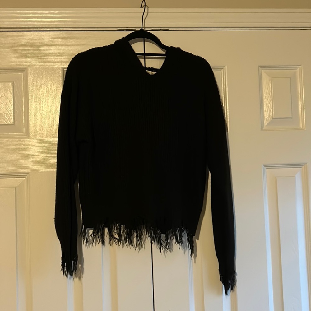 Cropped sweater with a hood